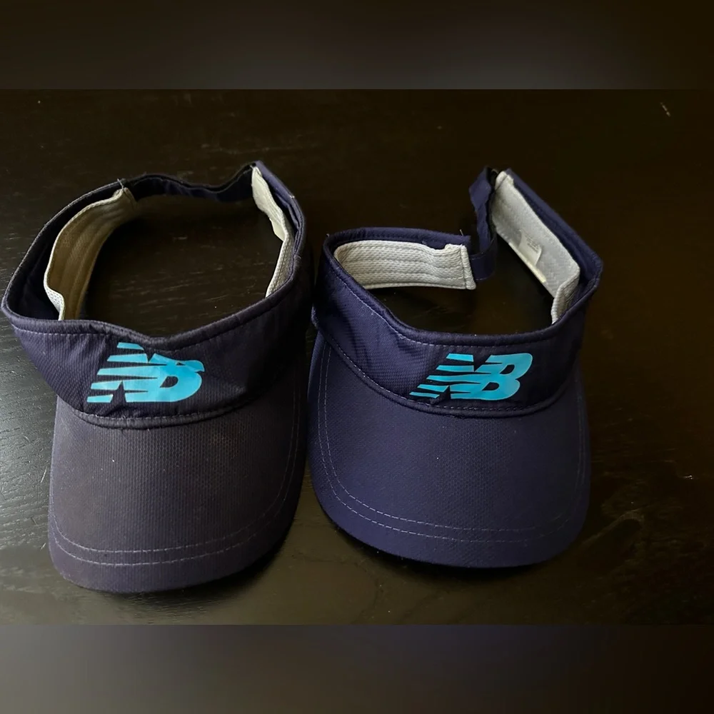 2 New Balance navy blue visors